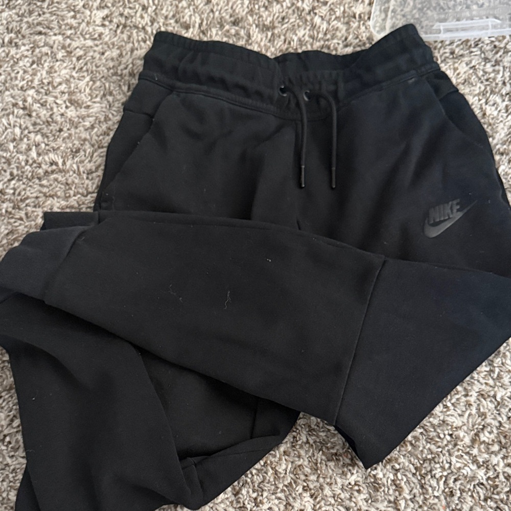 Youth Nike Black Fleece Joggers with Subtle Swoosh
